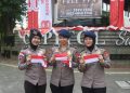 Brimob Metro Jaya Bagikan 5.000 Bendera Merah Putih kepada Warga Jakarta Jelang Hari Kemerdekaan RI