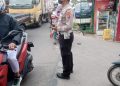 Polsek Panongan Laksanakan Strong Point Gatur Lalin di Perempatan Lugano Citra Raya